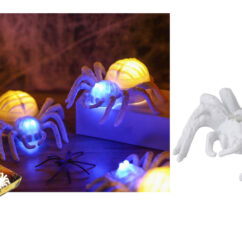 Valge halloweeni ämblik, mille seljas on led küünal.