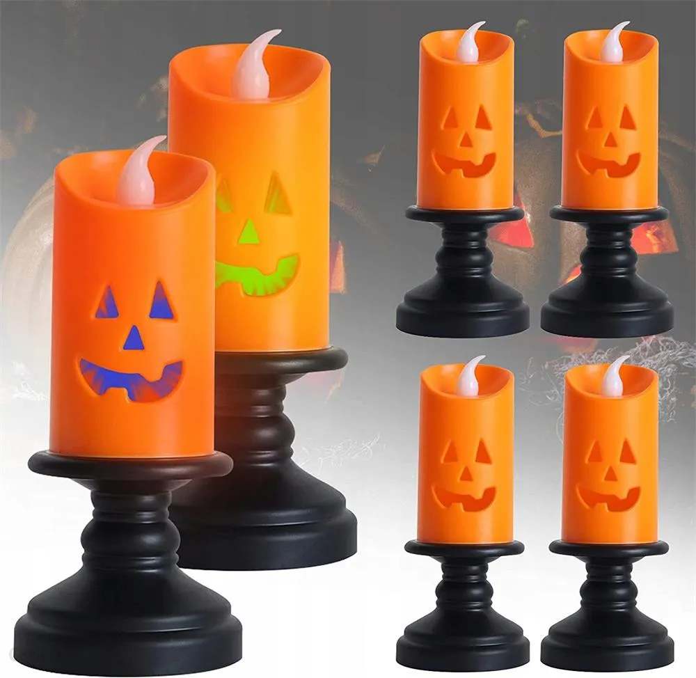 Halloweeni teemalised oranžid led küünlad.