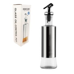 Õlipudel metallümbruse ja korgiga.