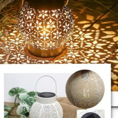 Solar lillemustriga päikeselamp sangaga tavaolekus ja valgustamas.